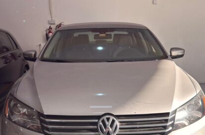 Volkswagen sedan front view at WagenKenner Dubai workshop for service and inspection