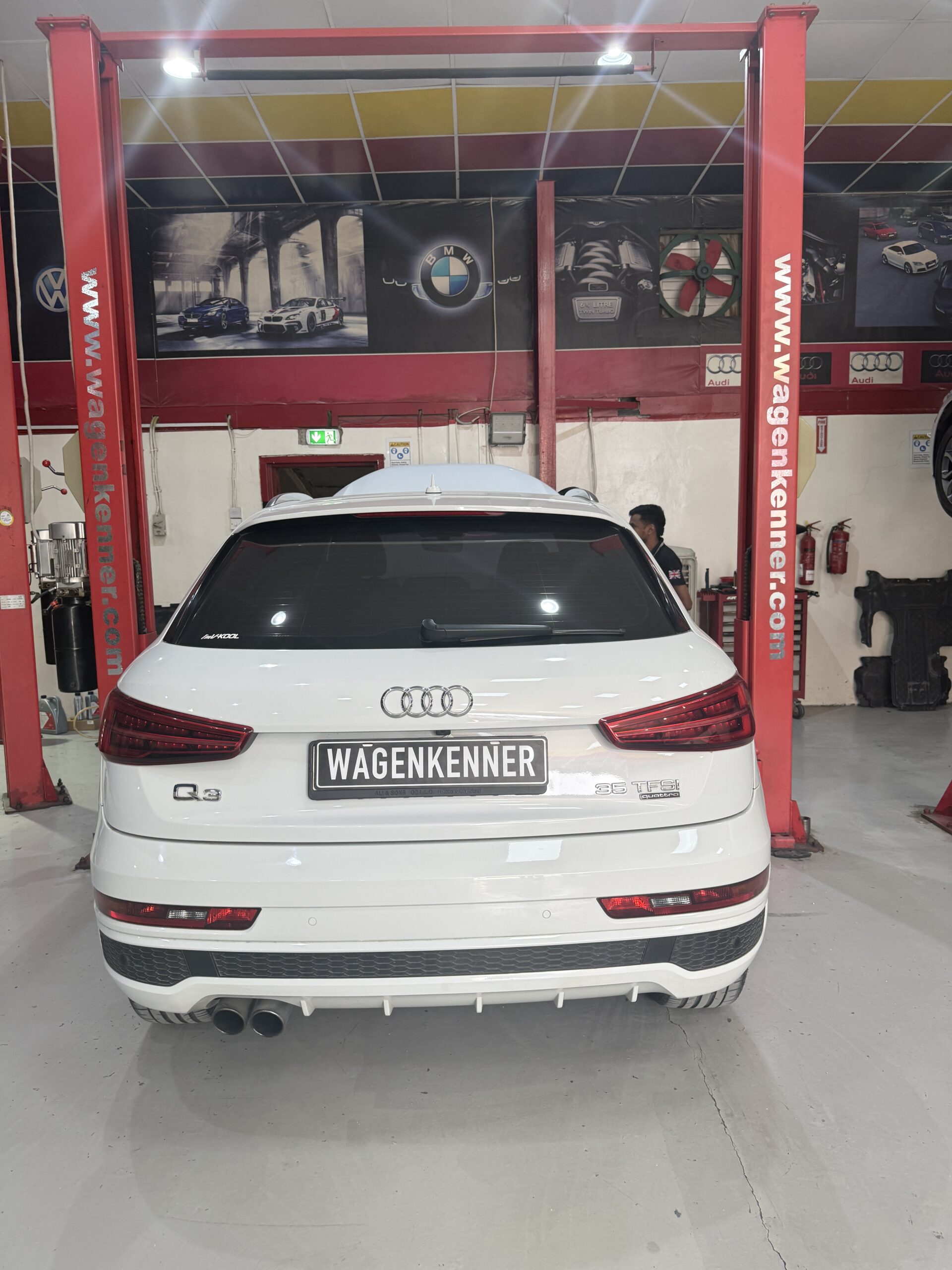 Rear view of a white Audi Q3 at WagenKenner workshop in Al Quoz 4, Dubai