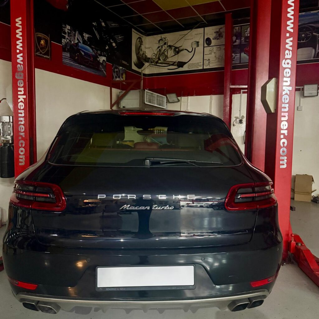 Rear view of a Porsche Macan Turbo at WagenKenner workshop in Al Quoz 4, Dubai