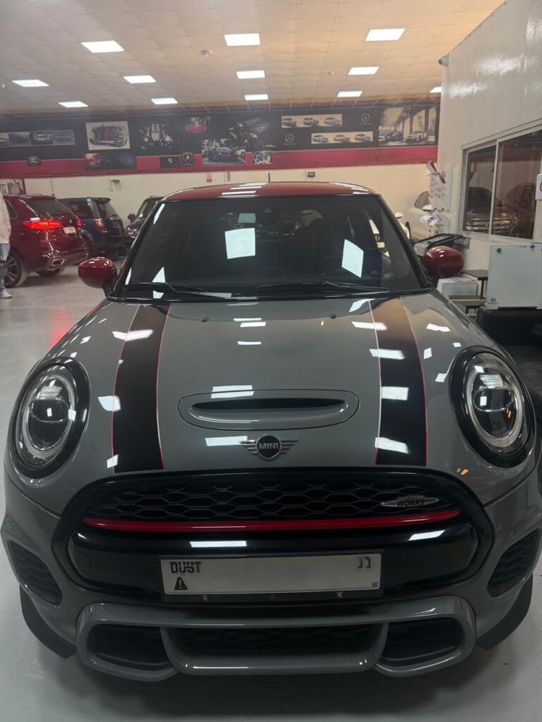 Front view of a grey MINI at WagenKenner workshop in Al Quoz 4, Dubai