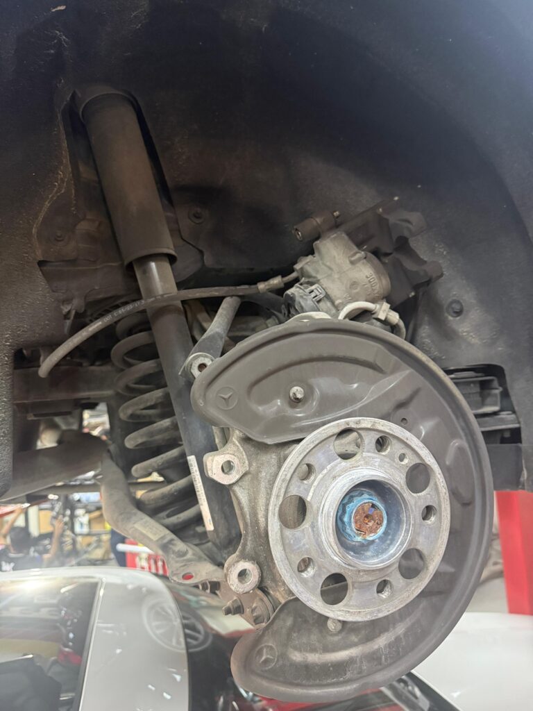 Mercedes wheel hub and brake shield with the brake disc removed at WagenKenner in Dubai