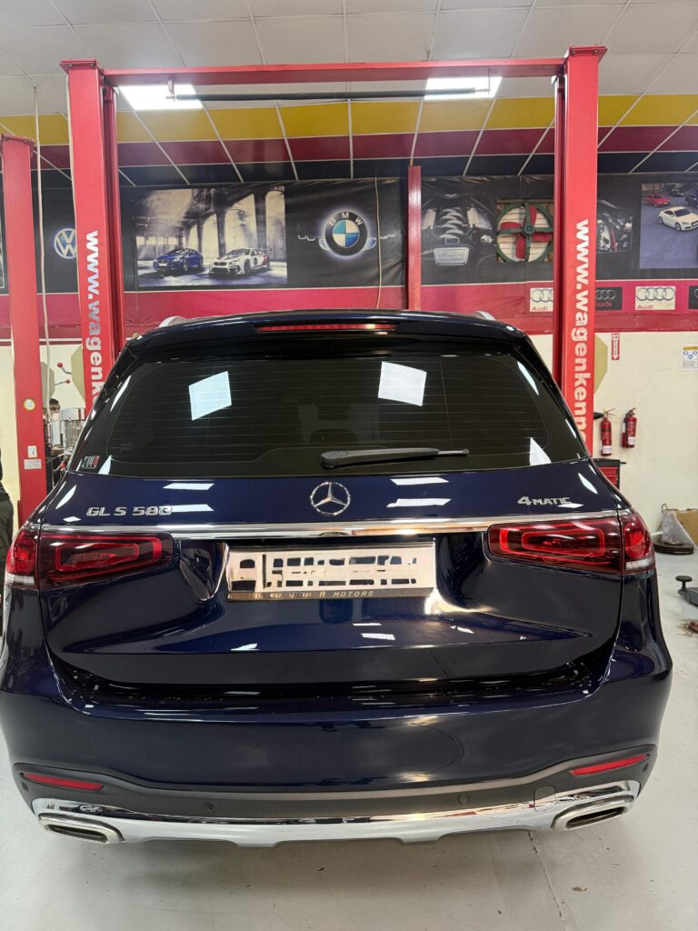 Rear view of a blue Mercedes-Benz SUV at WagenKenner workshop in Al Quoz 4, Dubai